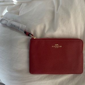 Red Coach Wristlet. Never been used.